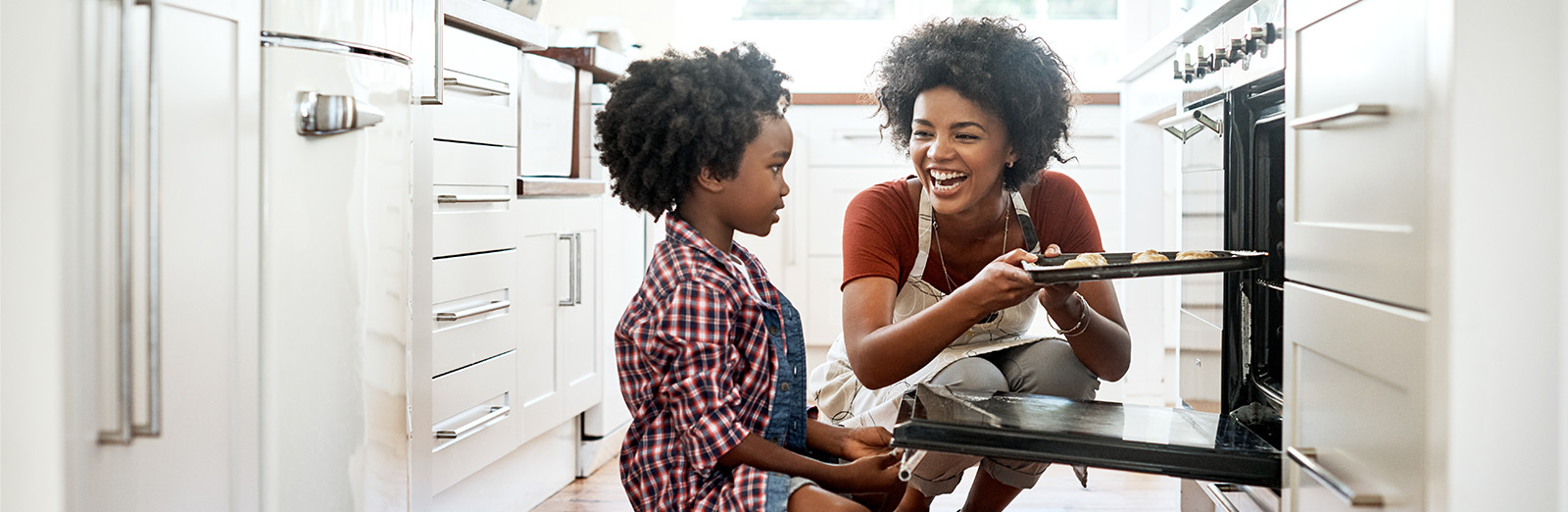 Mom and child baking cookies