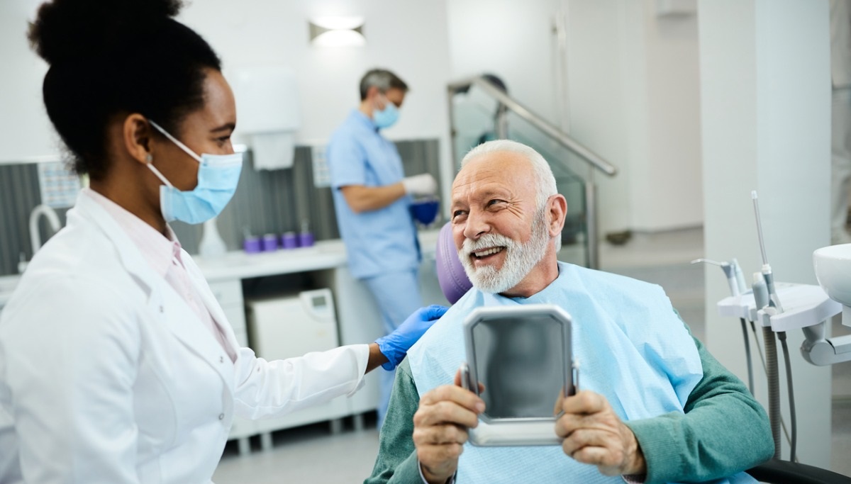 Smiling man and Dentist